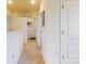Hallway leading to laundry room at 918 Noble Run, New Smyrna Beach, FL 32168