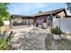 View of the home's fenced-in backyard, patio and screened in patio at 953 Tulip St, Deltona, FL 32725