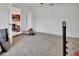 Bedroom with carpet flooring and an open doorway to another room at 953 Tulip St, Deltona, FL 32725