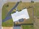 Stunning aerial view showcases the home's unique architecture, landscaped yard, and private driveway at 1032 Bel Aire Dr, Daytona Beach, FL 32118