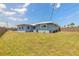 Charming single-story home featuring a spacious backyard, perfect for outdoor activities and relaxation at 1032 Bel Aire Dr, Daytona Beach, FL 32118
