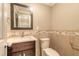 Stylish powder room features a modern vanity, vessel sink and tiled walls at 1032 Bel Aire Dr, Daytona Beach, FL 32118