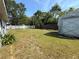 Spacious backyard featuring a shed and well-maintained lawn area at 1081 Cobblestone Ave, Deltona, FL 32725