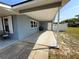 Covered outdoor patio area with concrete flooring at 1081 Cobblestone Ave, Deltona, FL 32725