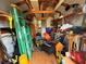Interior view of shed with storage and lawn care equipment at 1081 Cobblestone Ave, Deltona, FL 32725