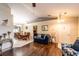 Spacious living room area features hardwood floors and an open floor plan to the dining area at 1113 Fort Smith Blvd, Deltona, FL 32725