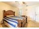 Bedroom featuring comfortable bed, soft carpet, dresser, and bathroom at 1113 Fort Smith Blvd, Deltona, FL 32725