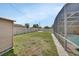 Wide backyard with storage shed and screened pool area, perfect for entertaining at 1142 Glendale Ave, Deltona, FL 32725