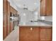 Open kitchen featuring stainless steel appliances and breakfast bar at 1142 Glendale Ave, Deltona, FL 32725