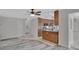 Open floor plan with tile and wood flooring and natural light at 1142 Glendale Ave, Deltona, FL 32725