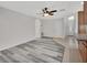 Inviting living room area featuring modern flooring and neutral color walls at 1142 Glendale Ave, Deltona, FL 32725