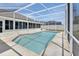 Enclosed pool with a screen for the Florida sunshine, with easy access to the home at 1142 Glendale Ave, Deltona, FL 32725
