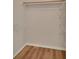 Empty walk-in closet with white shelving and wood floor at 1142 Glendale Ave, Deltona, FL 32725