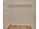 Empty walk-in closet with white shelving and wood floor at 1142 Glendale Ave, Deltona, FL 32725