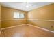 Bedroom with neutral walls, one window, and laminate floors at 115 Oaks Ct # 115, Sanford, FL 32771