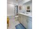 Bathroom showcasing vanity and tub with shower at 1183 Cabot Cliffs Dr, Daytona Beach, FL 32124