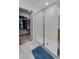 Bright bathroom featuring a glass shower and a view into a closet at 1183 Cabot Cliffs Dr, Daytona Beach, FL 32124