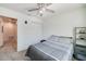 Bedroom showcasing a ceiling fan and double closet doors at 1183 Cabot Cliffs Dr, Daytona Beach, FL 32124