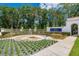 The LPGA International entrance features a water fountain and landscaping offering an inviting and elegant welcome at 1183 Cabot Cliffs Dr, Daytona Beach, FL 32124