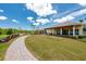 A view of the LPGA Clubhouse offers a glimpse of the community's upscale resort-style amenities at 1183 Cabot Cliffs Dr, Daytona Beach, FL 32124