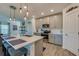Well-equipped kitchen with stainless steel appliances, a quartz countertop, and a breakfast bar at 1183 Cabot Cliffs Dr, Daytona Beach, FL 32124