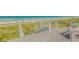 Breathtaking ocean views from this wooden deck with a spiral staircase at 1209 N Atlantic Ave, New Smyrna Beach, FL 32169