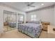 Spacious bedroom with mirrored closet doors, offering ample storage and style at 1209 N Atlantic Ave, New Smyrna Beach, FL 32169