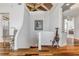 Hallway with hardwood floors, unique architecture, and decorative giraffe at 1209 N Atlantic Ave, New Smyrna Beach, FL 32169