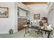 Office space with a large desk, filing cabinets, and bright lighting at 1209 N Atlantic Ave, New Smyrna Beach, FL 32169