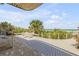 Charming outdoor patio with dining table and chairs, offering picturesque ocean views at 1209 N Atlantic Ave, New Smyrna Beach, FL 32169