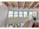 Stunning beach views from the multiple large windows of this coastal home at 1209 N Atlantic Ave, New Smyrna Beach, FL 32169