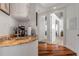 Convenient wet bar area with granite countertop, sink, and views into the home at 1209 N Atlantic Ave, New Smyrna Beach, FL 32169