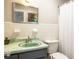 Bathroom featuring a green sink, white tiles, and shower with a white curtain at 1284 Vanderbilt Dr, Ormond Beach, FL 32174