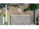 Aerial view of backyard featuring a fire pit with chairs, a shed, and privacy fence at 1326 13Th St, Orange City, FL 32763