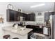 Well-equipped kitchen with granite countertops and stainless steel appliances at 1326 13Th St, Orange City, FL 32763
