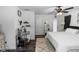 Main bedroom area featuring a large mirror and a doorway to the bathroom at 1326 13Th St, Orange City, FL 32763