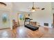 Exercise room featuring wood floors, a ceiling fan, and a treadmill at 140 Rodeo Rd, Ormond Beach, FL 32174