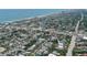 An aerial shot capturing the home's location within a vibrant coastal community with views of the ocean at 145 S Peninsula Dr, Daytona Beach, FL 32118