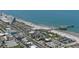 Picturesque aerial view of the city beach highlighting the scenic coastline, amusement park, and entertainment options nearby at 145 S Peninsula Dr, Daytona Beach, FL 32118