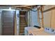 Basement laundry area includes washer and dryer with stairs going to the main level of the home at 145 S Peninsula Dr, Daytona Beach, FL 32118