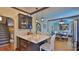 Open kitchen design with marble countertop and dining area at 145 S Peninsula Dr, Daytona Beach, FL 32118