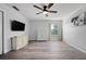 Bonus room with gray walls, light-colored floors, and a ceiling fan at 1491 Nappa Dr, Port Orange, FL 32128