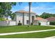 Inviting two-story home with well-manicured lawn and attached two-car garage at 1491 Nappa Dr, Port Orange, FL 32128