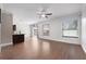 Open concept living room featuring wood floors and neutral wall color at 1491 Nappa Dr, Port Orange, FL 32128