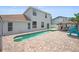 Backyard pool, patio, and tiki hut, perfect for outdoor entertaining at 1491 Nappa Dr, Port Orange, FL 32128