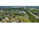 Panoramic aerial view of residential area near a tranquil lake and a highway for easy commuting at 160 Point O Woods Dr, Daytona Beach, FL 32114