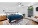 Inviting bedroom with a cozy bed, modern decor, and an arched window at 160 Point O Woods Dr, Daytona Beach, FL 32114