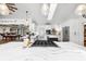 Spacious kitchen with a center island with a cooktop, stainless steel refrigerator, and breakfast bar at 160 Point O Woods Dr, Daytona Beach, FL 32114