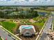 Community with clubhouse, pool, playground, and scenic walking trails around the pond at 16241 Honey Harvest St, Winter Garden, FL 34787