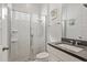 Modern bathroom with white subway tile shower, glass door, sleek vanity, and contemporary fixtures at 16241 Honey Harvest St, Winter Garden, FL 34787